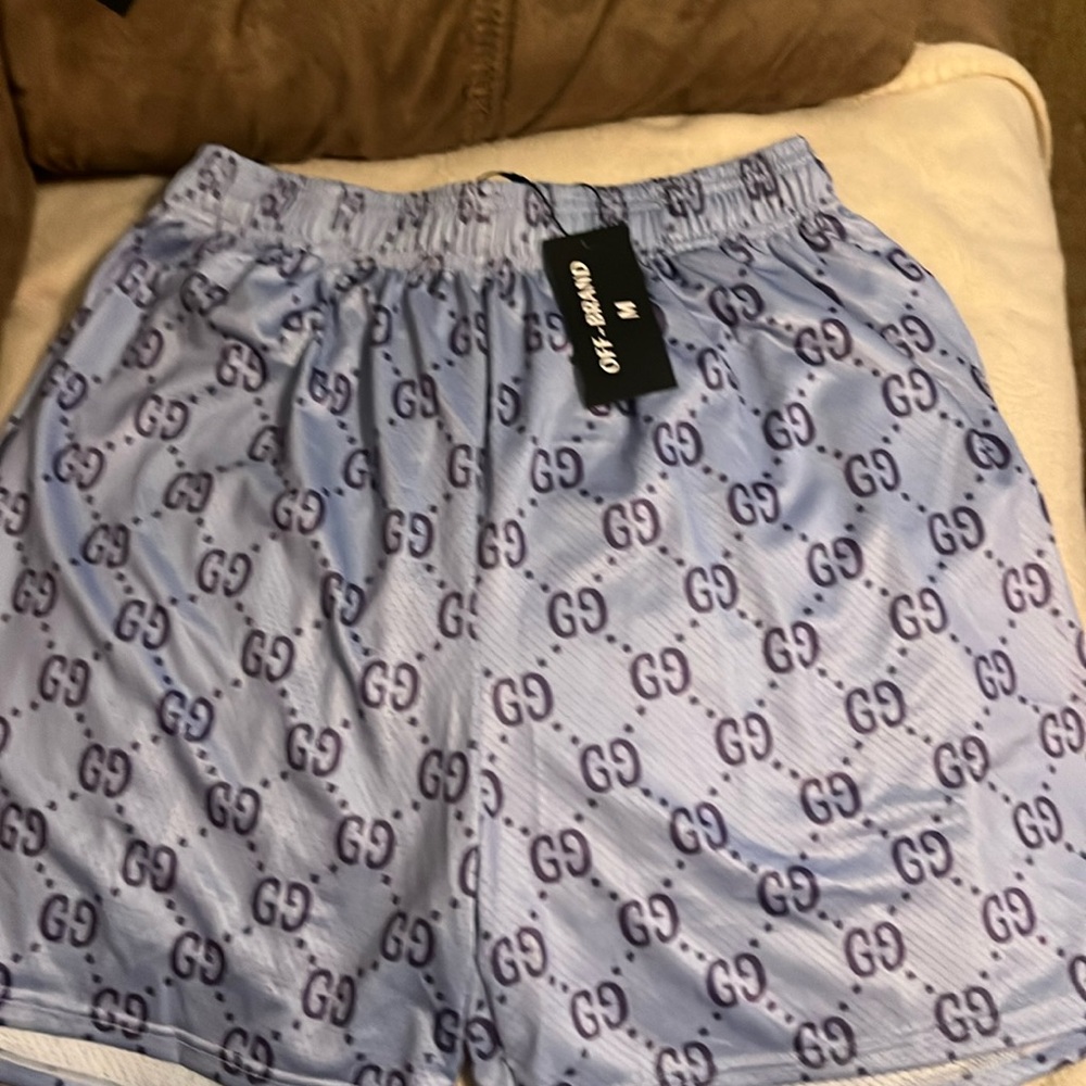 NWT mens Medium  OFF Brand GG blue and white repeat mesh shirts